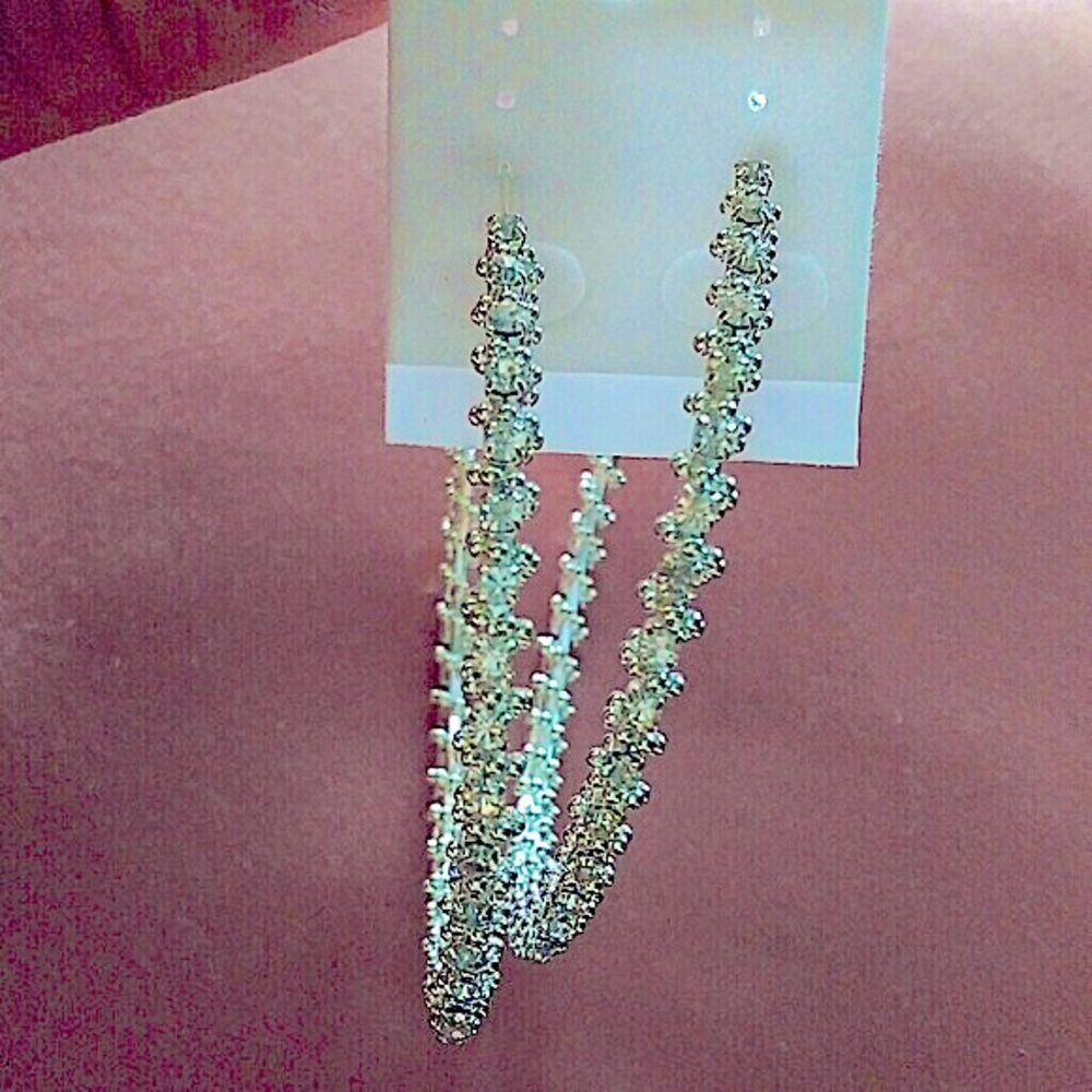 New beautiful silver tone twisting bling hoops